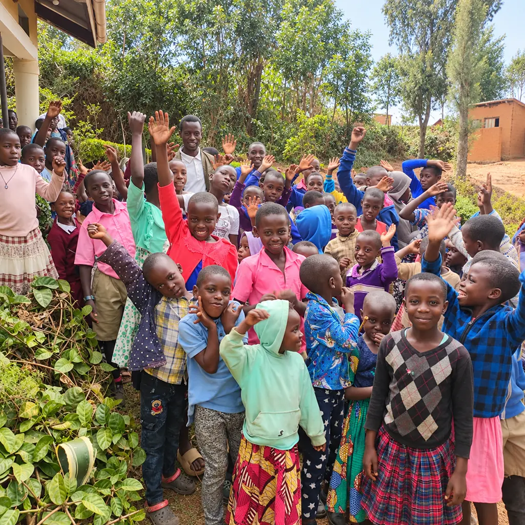 Smiling children from the Children of Hope Village community in Uganda